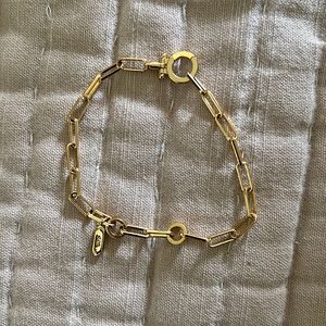Delicate gold charm keeper bracelet